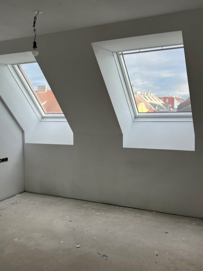 2-Zimmer-Dachgeschosswohnung (Massivbauweise) in generalsaniertem Altbau mit Loggia - Bild