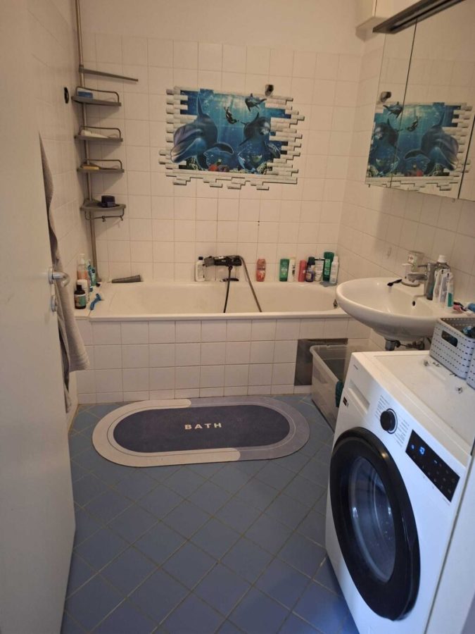 Neuwertige 3 Zimmer Eigentumswohnung mit Swimmingpool am Dach - Bild